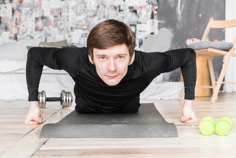 sportsman-doing-push-ups-mat_23-2148241634