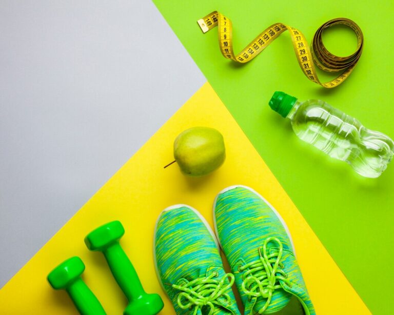 top-view-arrangement-with-sports-attributes-apple_23-2148259083