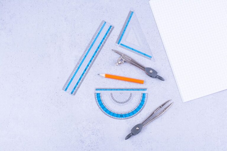 blank-notebook-with-ruler-pens-around_114579-34341