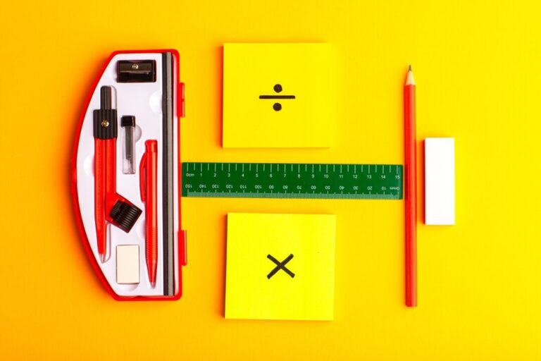 front-view-geometric-figures-with-stickers-pencil-yellow-surface_140725-63968